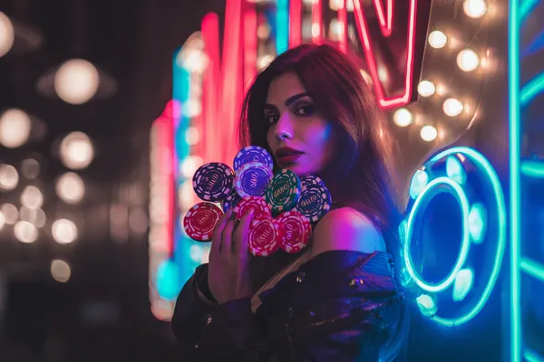 A woman in a luxurious green gown next to an ornate roulette wheel, capturing the upscale casino mood of BET786.